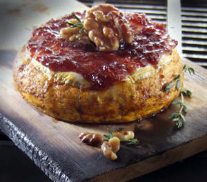 Cedar Planked Brie with Sun Dried Cherry Sauce