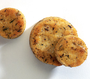 Herbed Polenta with Sun Dried Tomato Sauce