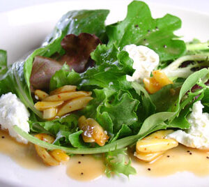 Mixed Greens with Candied Almonds and Goat Cheese