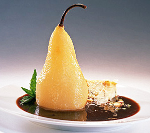 Poached Pear with Stilton Cheese, Pistachio Nuts, and Sun Dried Cherry Sauce